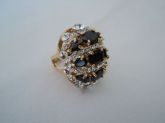 Anel Dourado c/Strass e Pedras Negras - 590